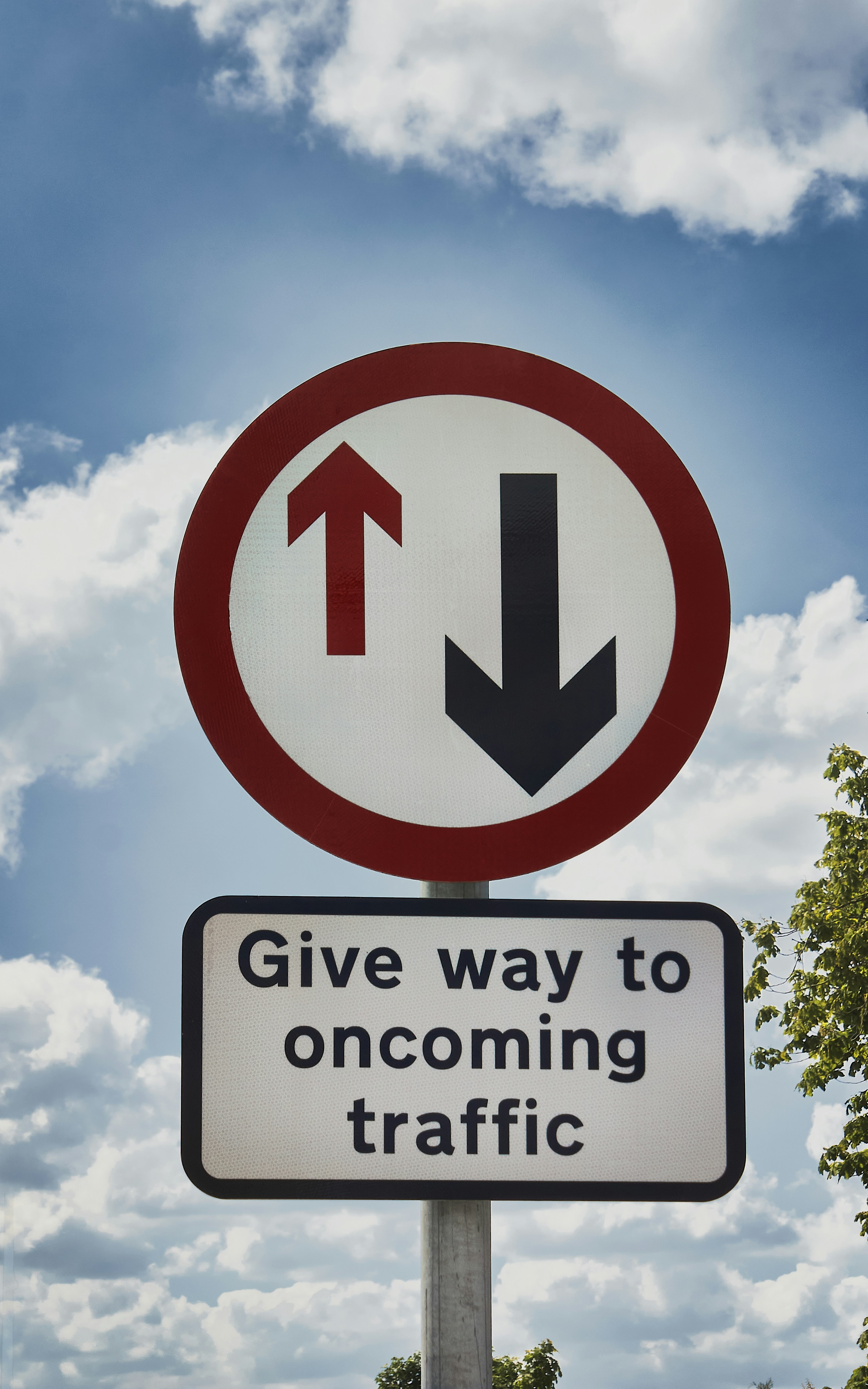 A traffic sign warning drivers to give way to oncoming traffic at Ebrington Centre in County Londonderry (May, 2021).